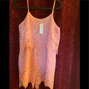 Pink Francesca’s Romper! Brand new. Medium